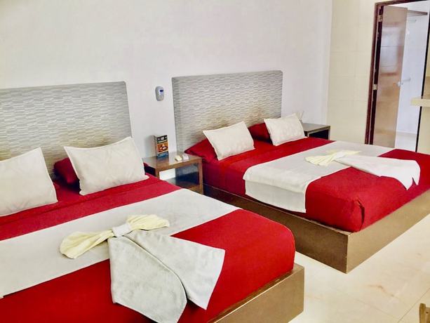 Imagen de la habitación del Hotel Aquamarina Suites. Foto 2