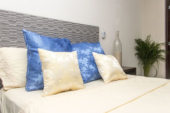 Imagen de la habitación del Hotel Aquamarina Suites. Foto 16