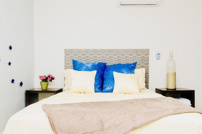 Imagen de la habitación del Hotel Aquamarina Suites. Foto 18