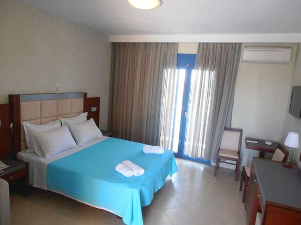 Imagen de la habitación del Hotel Aquamarine. Foto 17