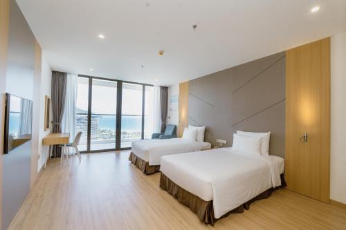 Imagen de la habitación del Hotel Aquamarine Resort Cam Ranh. Foto 18