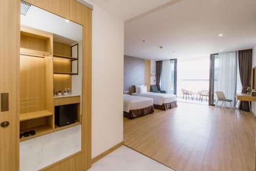 Imagen de la habitación del Hotel Aquamarine Resort Cam Ranh. Foto 20