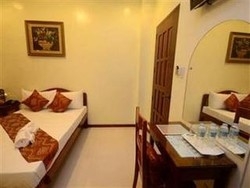 Imagen de la habitación del Hotel Aquari Travellers Suites. Foto 5