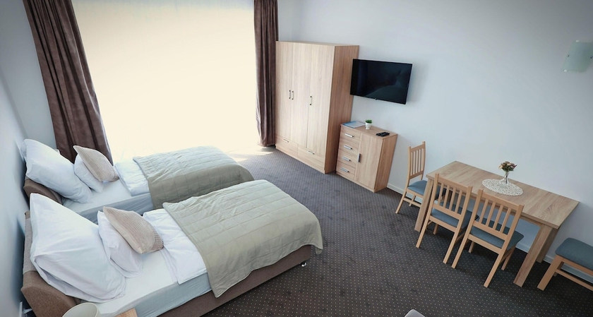 Imagen de la habitación del Hotel Aquarius Apartments. Foto 10