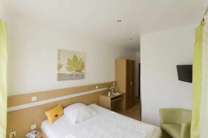 Imagen de la habitación del Hotel Aquarius, Braunschweig. Foto 8