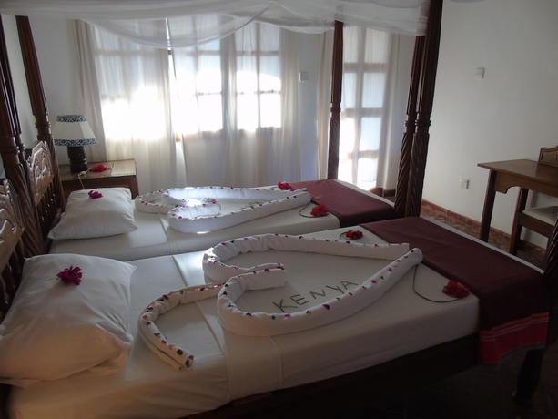 Imagen de la habitación del Hotel Aquarius Club International Resort. Foto 6