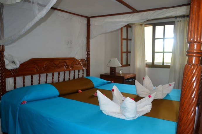 Imagen de la habitación del Hotel Aquarius Club International Resort. Foto 7