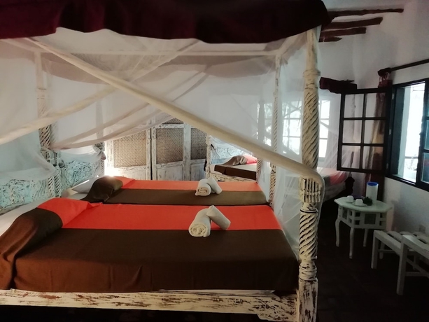 Imagen de la habitación del Hotel Aquarius Club International Resort. Foto 16