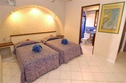 Imagen de la habitación del Hotel Aquatech Villas De Rosa. Foto 6