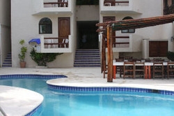 Imagen de la piscina del Hotel Aquatech Villas De Rosa. Foto 9