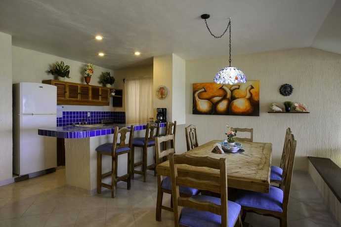 Imagen de la habitación del Hotel Aquatech Villas Derosa Resort. Foto 3