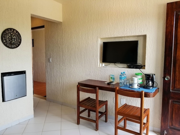 Imagen de la habitación del Hotel Aquatech Villas Derosa Resort. Foto 6