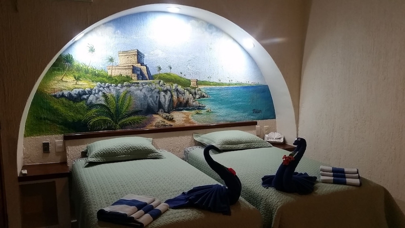 Imagen de la habitación del Hotel Aquatech Villas Derosa Resort. Foto 7