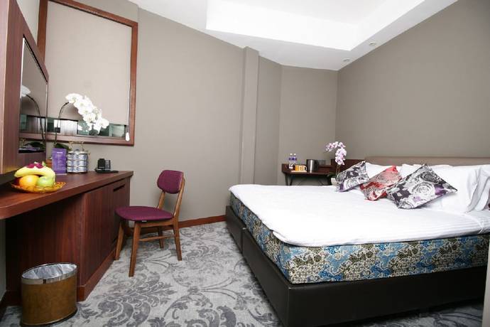Imagen de la habitación del Hotel Aqueen Joo Chiat. Foto 6