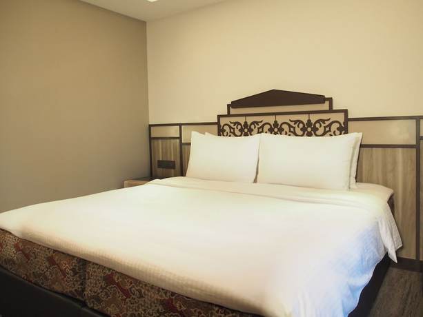 Imagen de la habitación del Hotel Aqueen Prestige Hotel Lavender. Foto 6