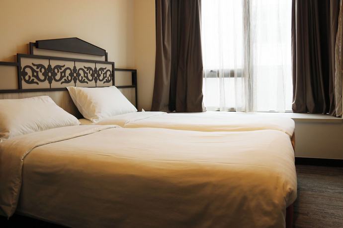 Imagen de la habitación del Hotel Aqueen Prestige Hotel Lavender. Foto 9