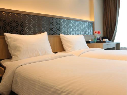 Imagen de la habitación del Hotel Aqueen Prestige Jalan Besar. Foto 11