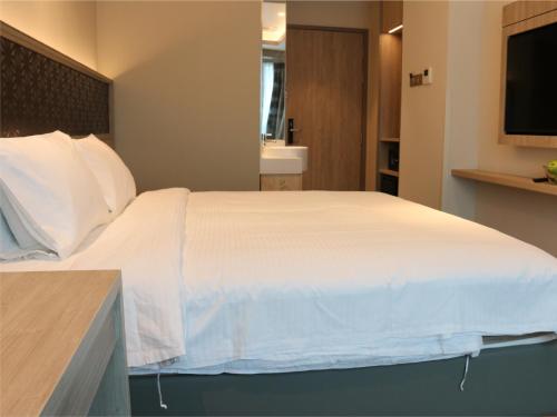 Imagen de la habitación del Hotel Aqueen Prestige Jalan Besar. Foto 12