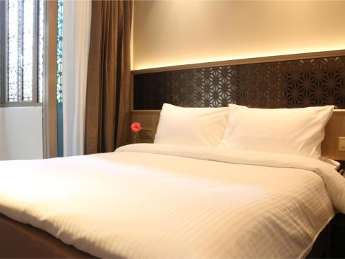 Imagen de la habitación del Hotel Aqueen Prestige Jalan Besar. Foto 15