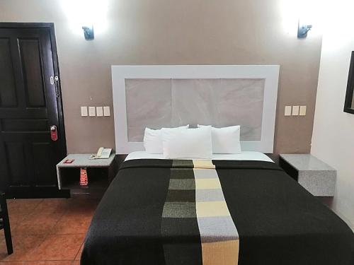 Imagen de la habitación del Hotel Aquiles. Foto 17