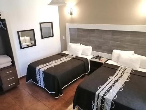 Imagen de la habitación del Hotel Aquiles. Foto 19