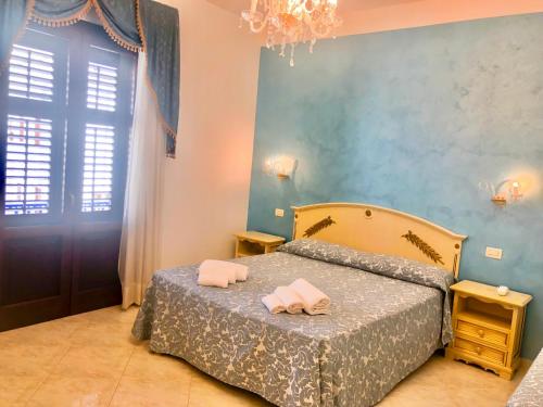 Imagen de la habitación del Hotel Araba Fenice, San Vito Lo Capo. Foto 6