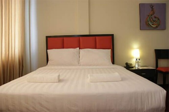 Imagen de la habitación del Hotel Arabelle Suites. Foto 16
