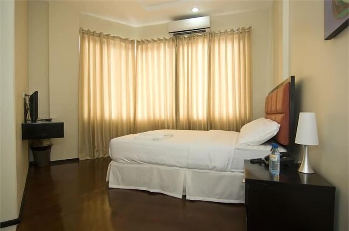 Imagen de la habitación del Hotel Arabelle Suites. Foto 17