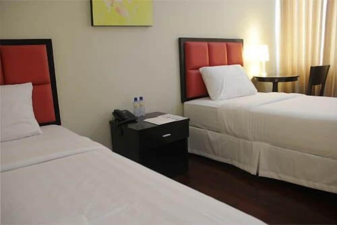 Imagen de la habitación del Hotel Arabelle Suites. Foto 18