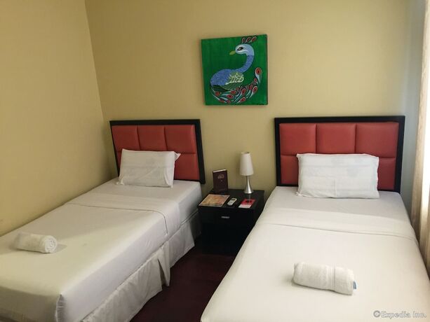 Imagen de la habitación del Hotel Arabelle Suites. Foto 19