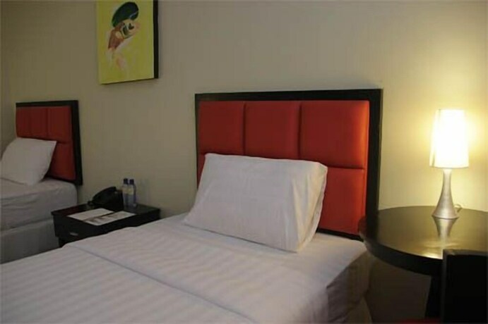 Imagen de la habitación del Hotel Arabelle Suites. Foto 23