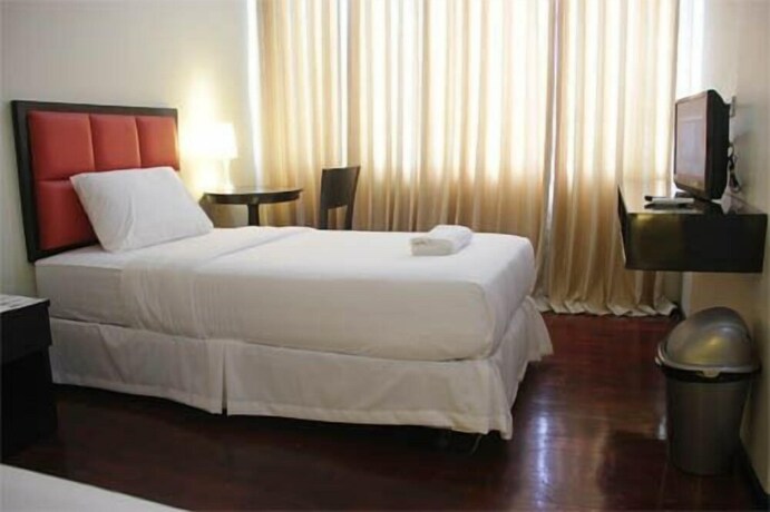 Imagen de la habitación del Hotel Arabelle Suites. Foto 24