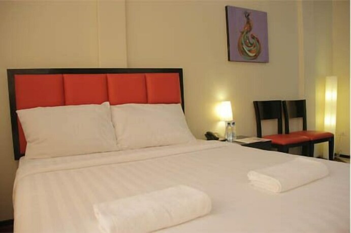 Imagen de la habitación del Hotel Arabelle Suites. Foto 25