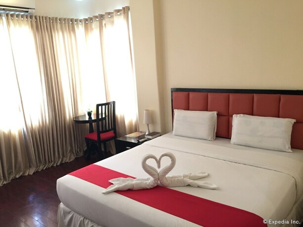 Imagen de la habitación del Hotel Arabelle Suites. Foto 27