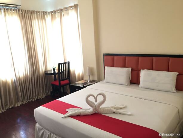 Imagen de la habitación del Hotel Arabelle Suites. Foto 29