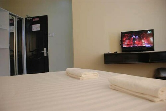 Imagen de la habitación del Hotel Arabelle Suites. Foto 30
