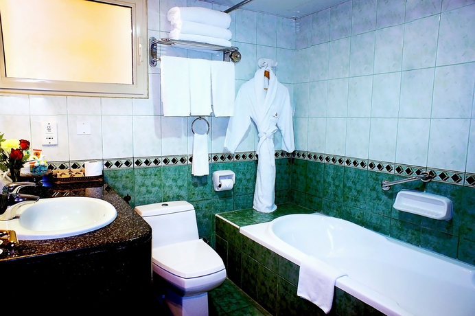 Imagen de la habitación del Hotel Arabian Courtyard and Spa. Foto 7