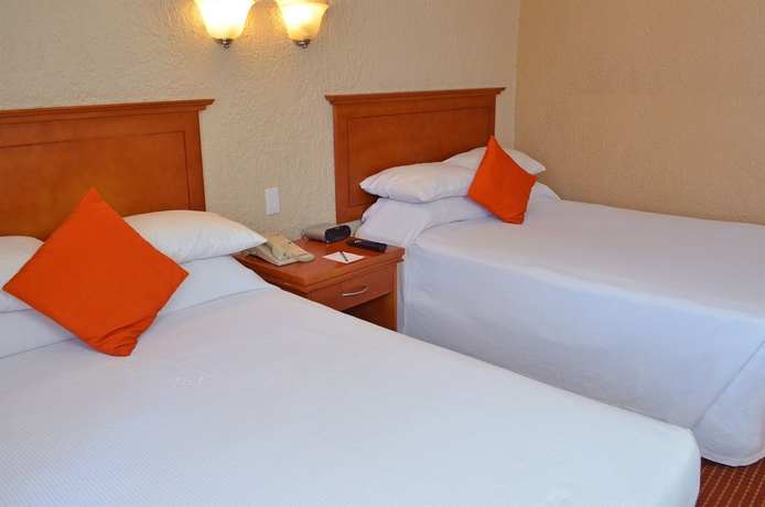 Imagen de la habitación del Hotel Araiza Palmira. Foto 4