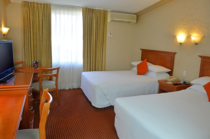 Imagen de la habitación del Hotel Araiza Palmira. Foto 5