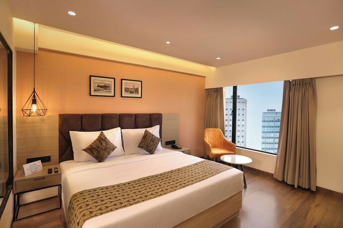 Imagen de la habitación del Hotel Aralia International Airport Mumbai. Foto 17
