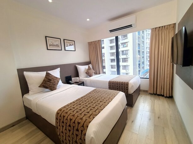 Imagen de la habitación del Hotel Aralia International Airport Mumbai. Foto 18