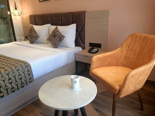 Imagen de la habitación del Hotel Aralia International Airport Mumbai. Foto 19