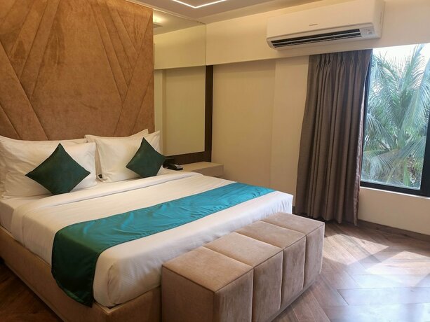 Imagen de la habitación del Hotel Aralia International Airport Mumbai. Foto 20