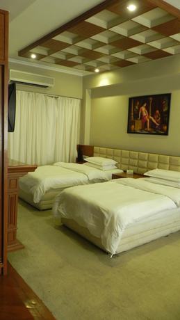 Imagen de la habitación del Hotel Aram, Jamnagar. Foto 2