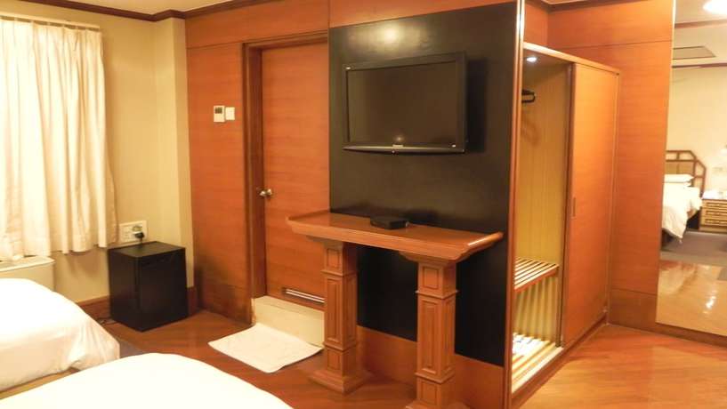 Imagen de la habitación del Hotel Aram, Jamnagar. Foto 3