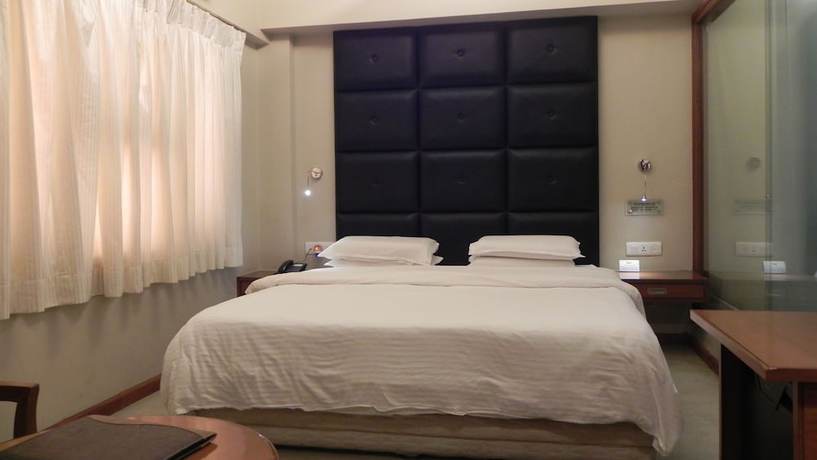 Imagen de la habitación del Hotel Aram, Jamnagar. Foto 5