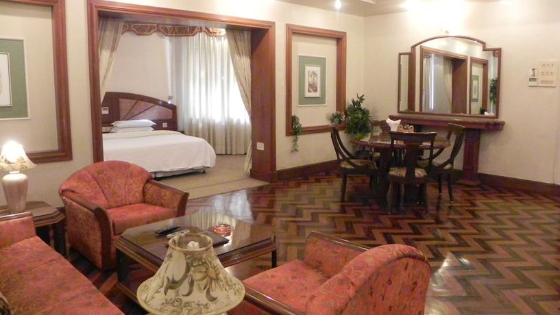 Imagen de la habitación del Hotel Aram, Jamnagar. Foto 6