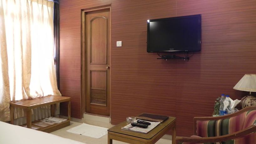 Imagen de la habitación del Hotel Aram, Jamnagar. Foto 8