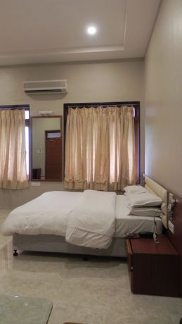 Imagen de la habitación del Hotel Aram, Jamnagar. Foto 9