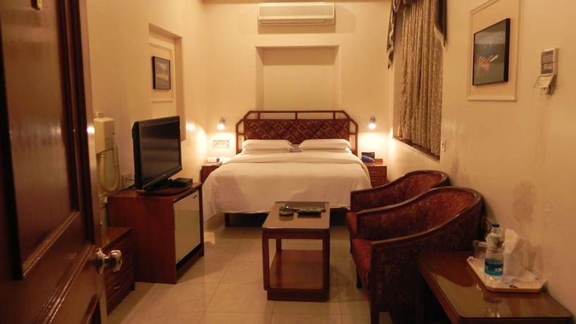 Imagen de la habitación del Hotel Aram, Jamnagar. Foto 10